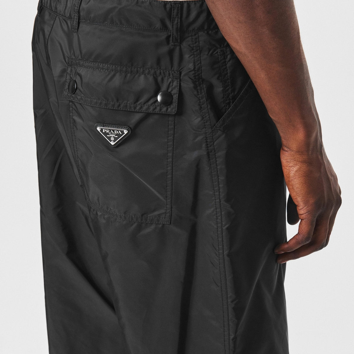 Prada Re-Nylon Tapered Trousers in Black